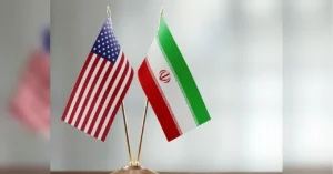 Прапори США та Ірану на золотих флагштоках поруч